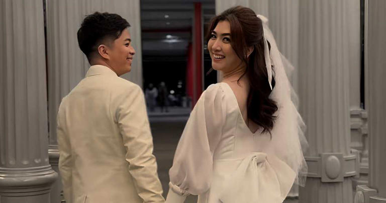 PJ Reblora and his charming wife in their wedding dress