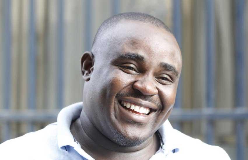 Cleophas Malala smiles to the camera